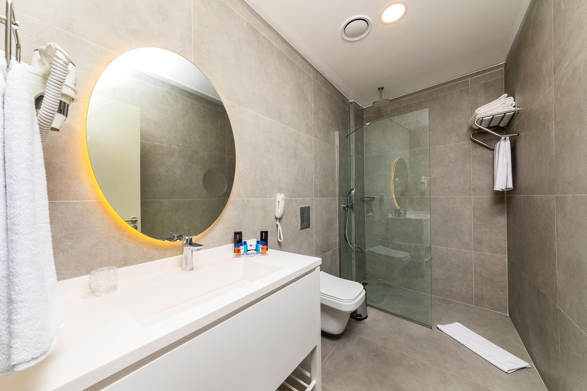 Professional bathroom mirror installation with architectural precision in Raleigh