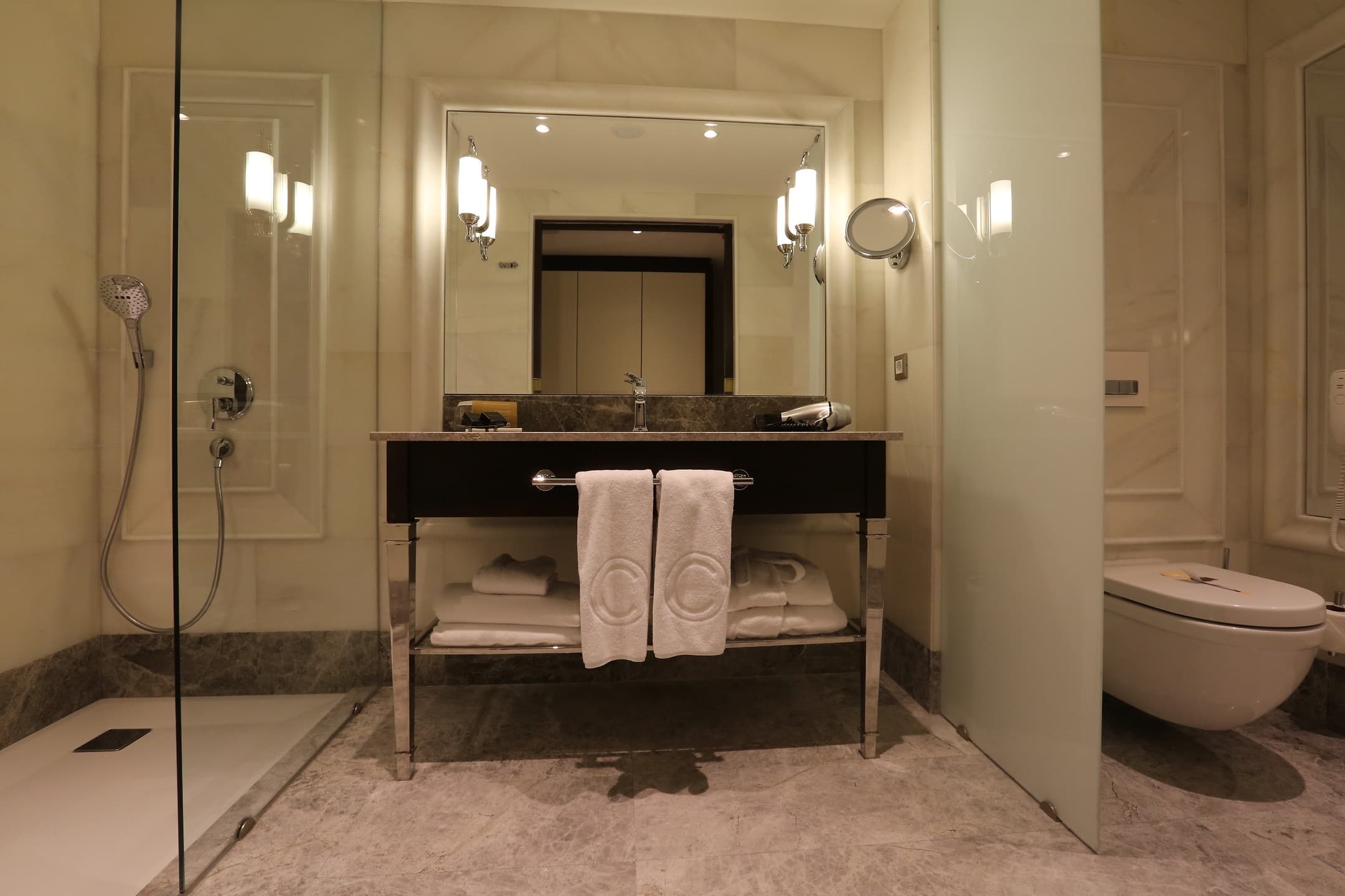 Custom bathroom vanity mirror with precision-cut edges and architectural design by interior architects