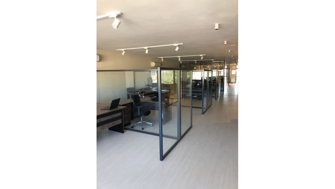 Elegant glass office door system for corporate environment in Greensboro