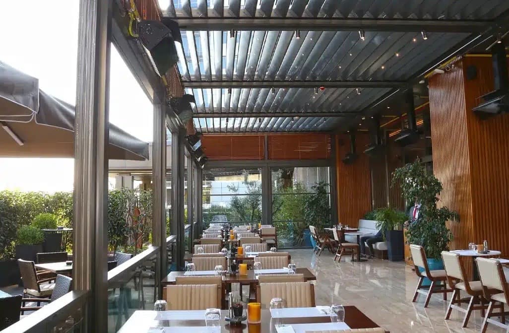 Commercial aluminum pergola covering outdoor seating